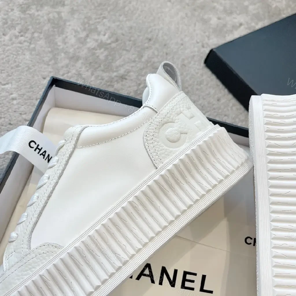 View 5 of Minimalist White Platform Sneakers with Subtle Accents