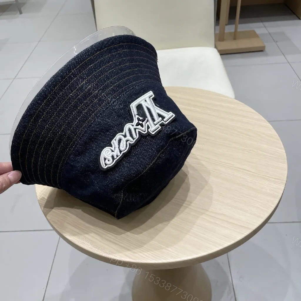 View 6 of Denim Bucket Hat + Embroidered Logo + Streetwear Chic + Luxury Detail + Hat