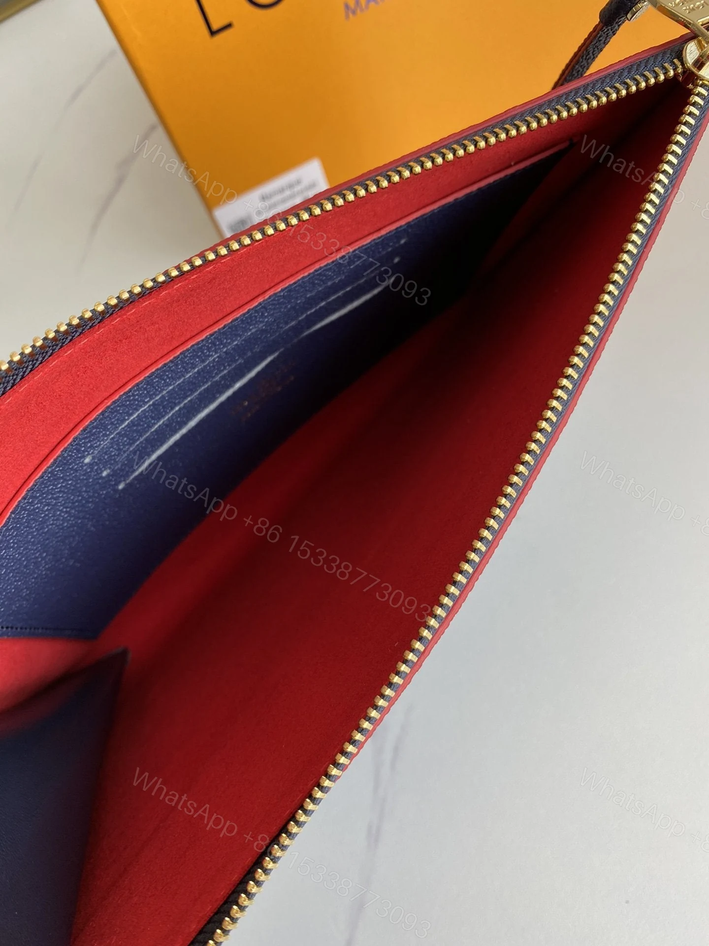 View 6 of Louis Vuitton Marine Rogue Monogram Empreinte Daily Pouch