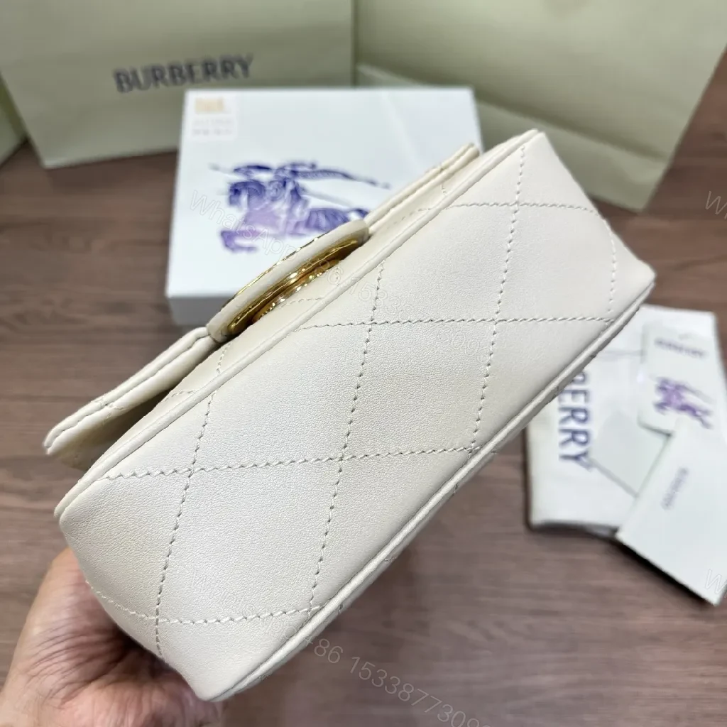 View 5 of Quilted Mini Crossbody: Diamond Stitch, Gold Hardware, Elegant Texture