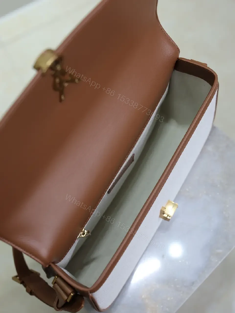 View 9 of Textured Crossbody Bag: Gold Hardware, Leather Trim, Chic Modern