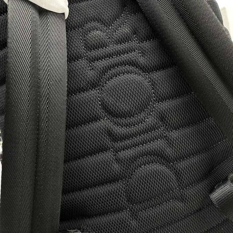 View 3 of Dark Oblique-Pattern Nylon Backpack: Luxe Everyday Utility