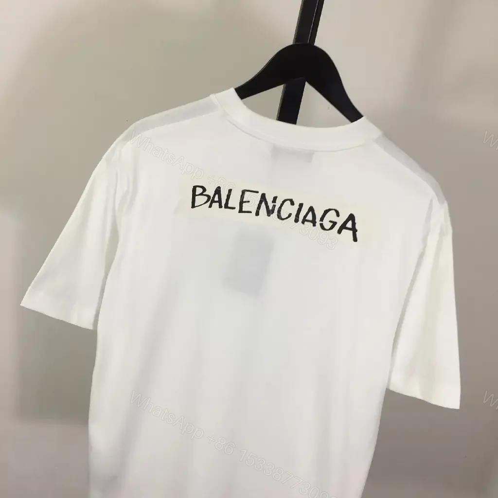 View 8 of Minimalist White Tee with Luxe Subtle Logo – Modern Essential T-Shirt