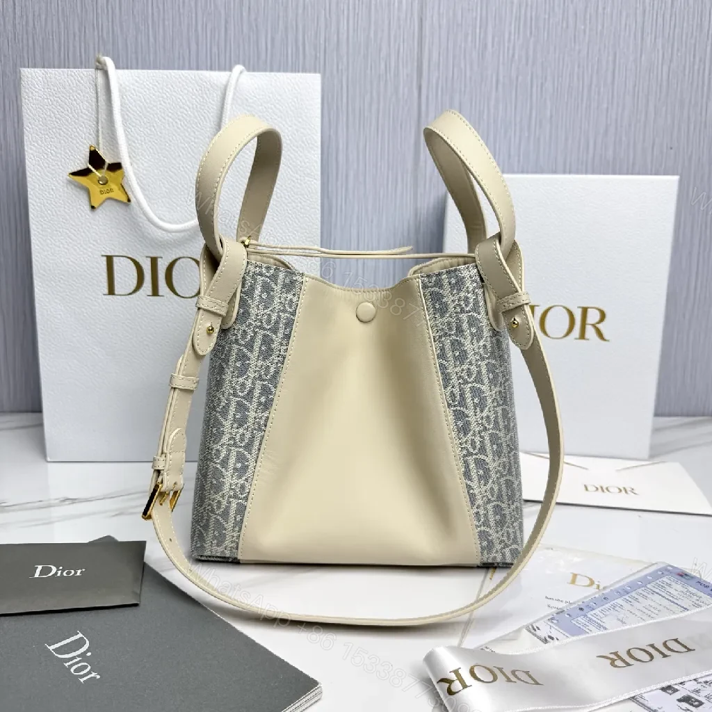 View 2 of Cream Leather & Denim-Inspired Bucket Bag, Structured Luxury