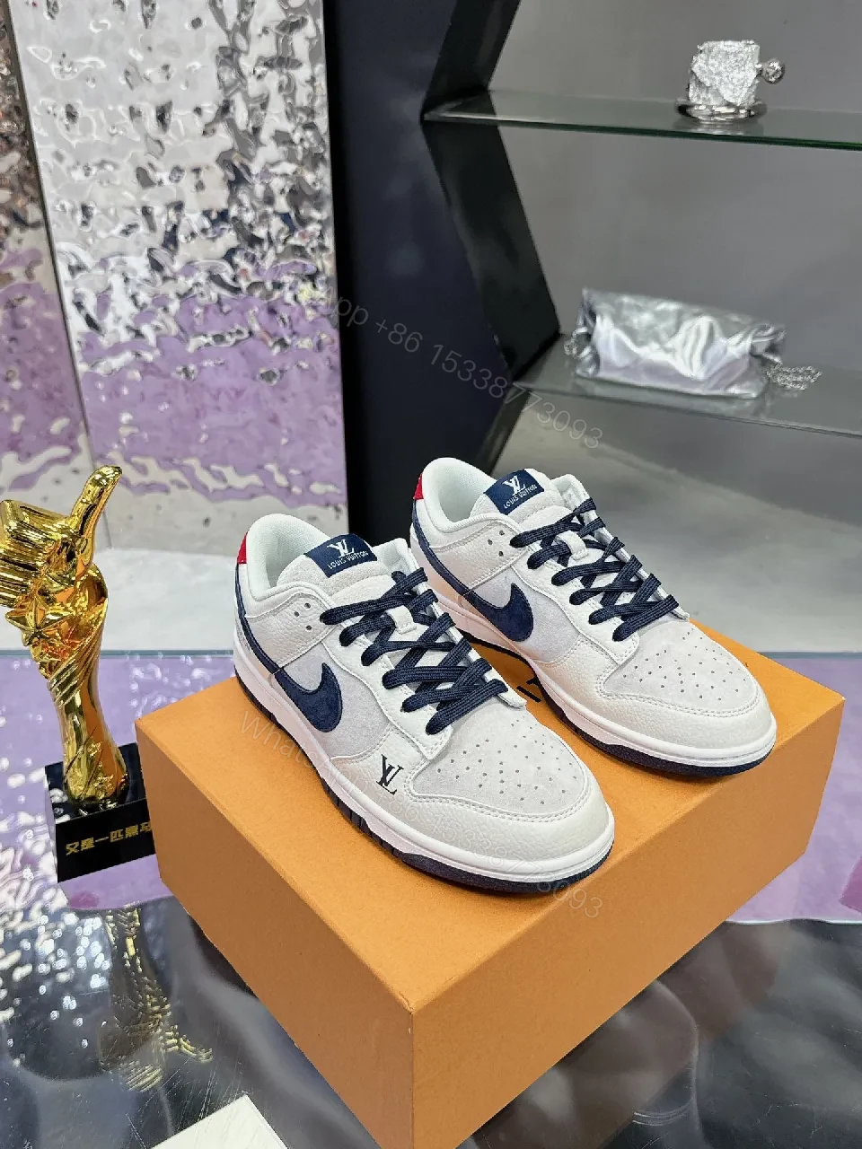 White Leather Navy Accented Low-Top Sneakers: Premium Comfort, Subtle LV-Inspired Detailing — view 1