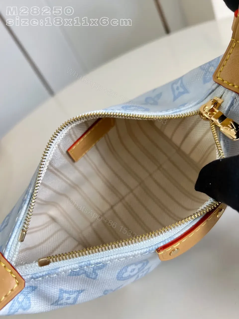 View 2 of Light Denim LV-Patterned Structured Top-Handle Bag
