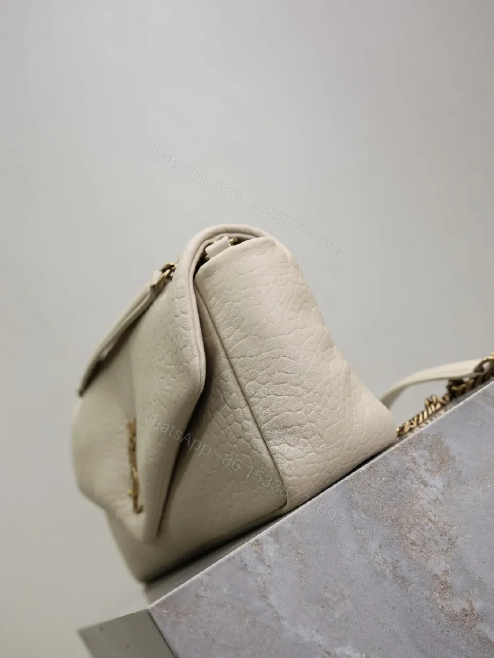View 6 of Ivory Pebbled Leather Chic Handbag with Gold Hardware