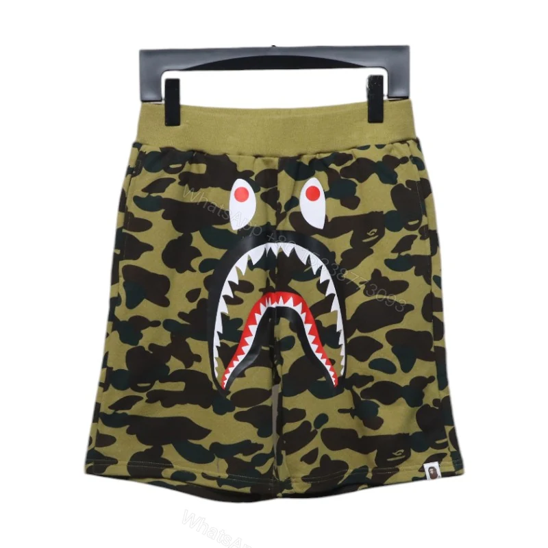 View 7 of BAPE Camouflage Shark Mouth Shorts Green