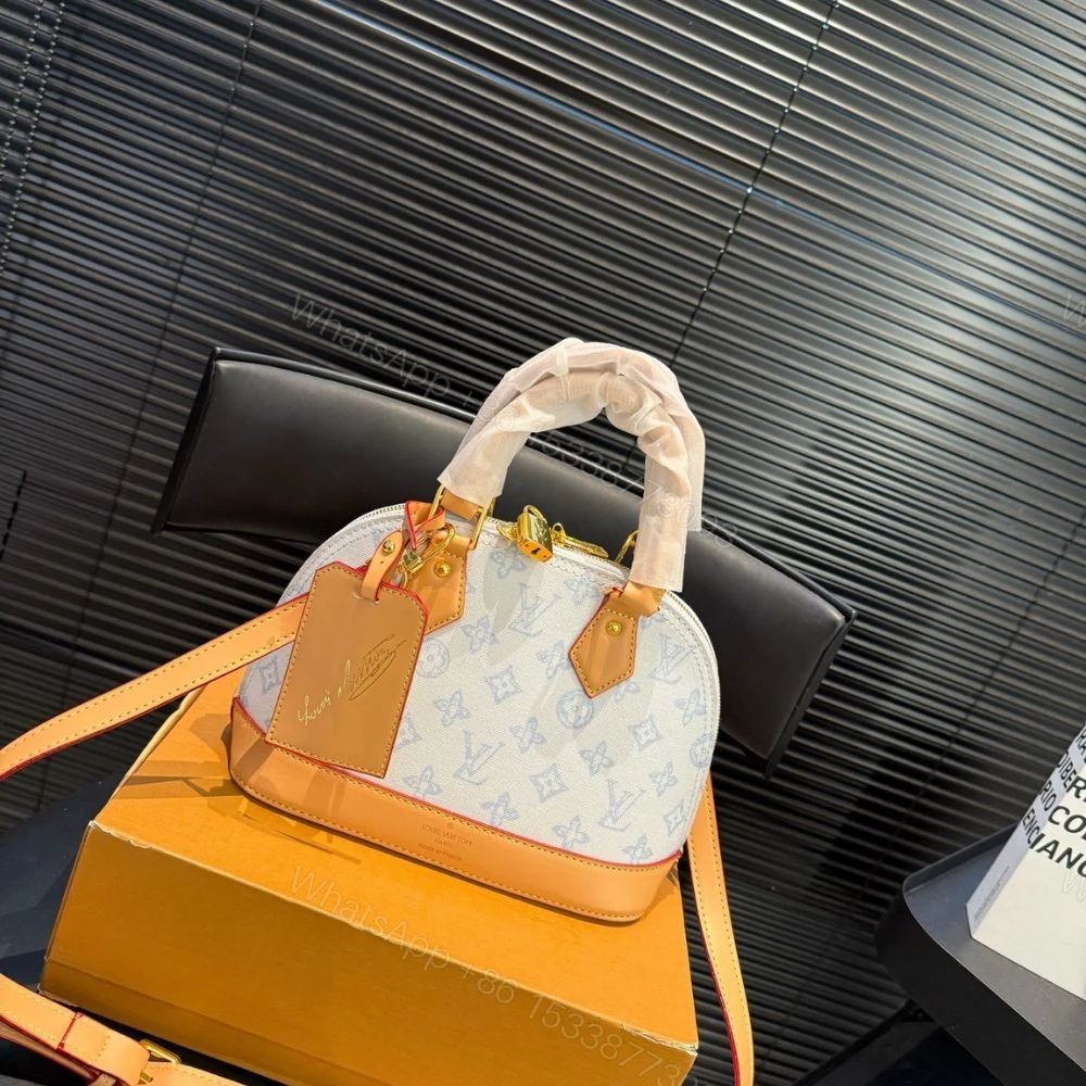 View 2 of Louis Vuitton Alma BB Monogram Origine Bleu Courrier 24Cm M27526