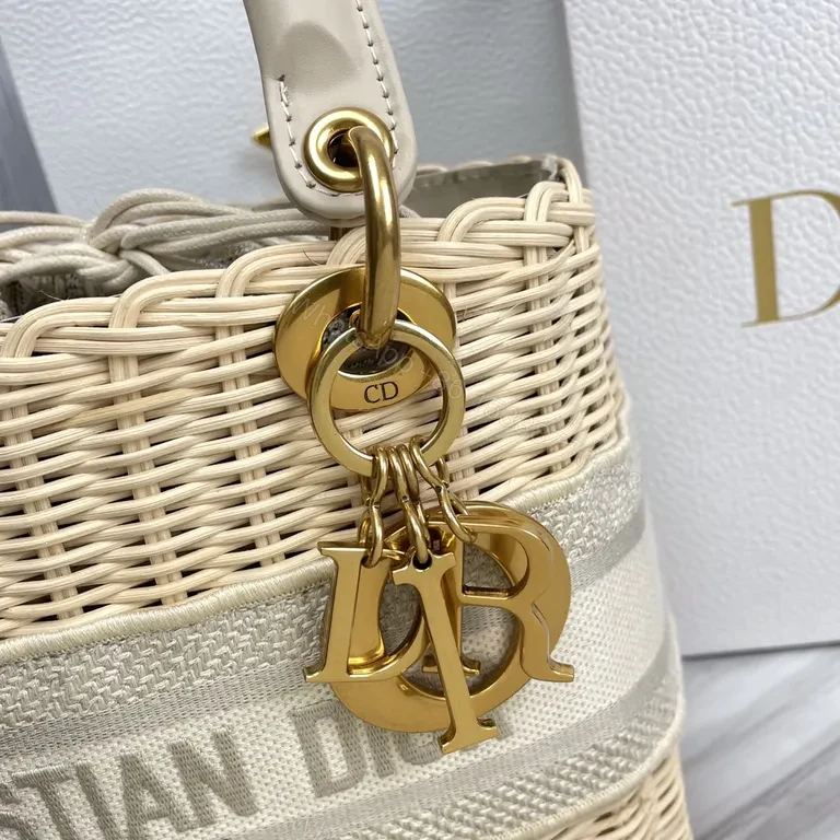 View 3 of Christian Dior Wicker Basket Bag - Ivory Leather Trim, Gold Hardware, Crossbody
