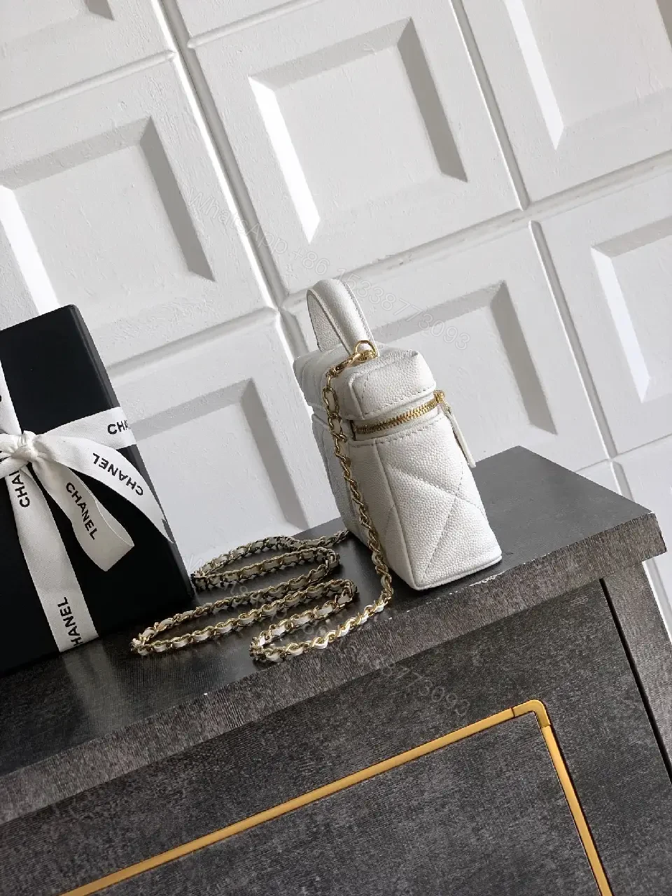 View 7 of White Quilted Mini Bag with Gold Hardware, Sleek Chic Carryall