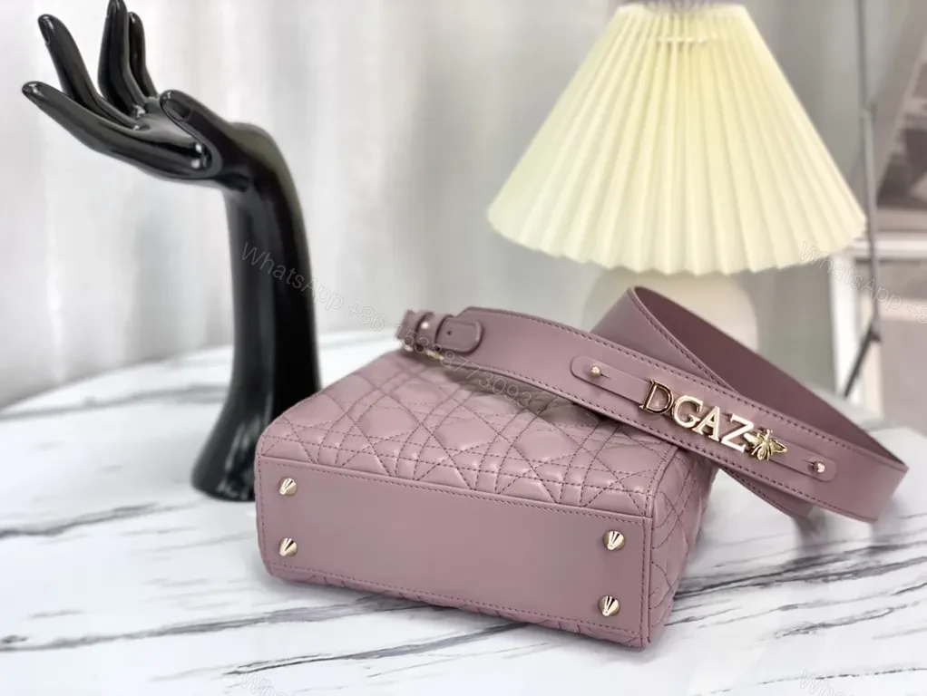 View 4 of Chic Quilted Mini Satchel with Gold Charms - All-Day Versatility