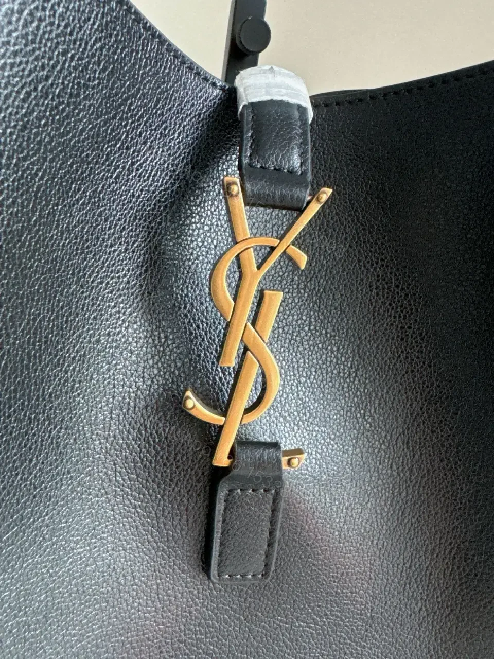 View 5 of Navy Leather Bucket Bag with Gold YSL Charm and Zippered Pocket