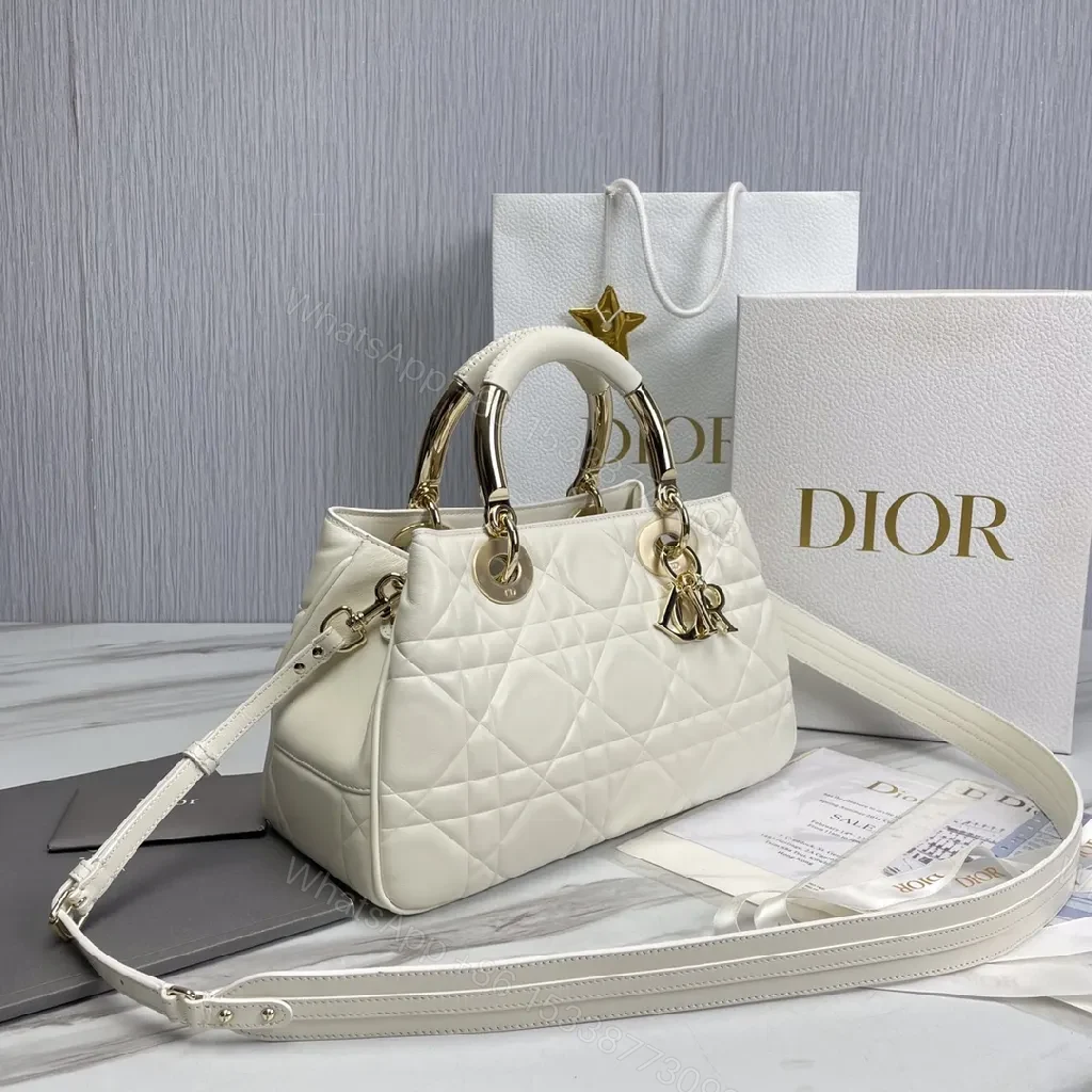 View 4 of Ivory Faux Leather Quilted Satchel with Signature Charms