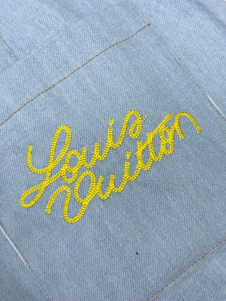 View 6 of Blue Denim Shorts with Embroidered Details, Louis Vuitton Style