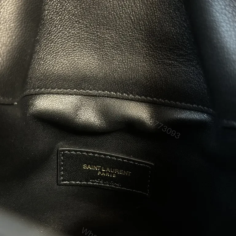 View 3 of Structured Black Quilted Bucket Bag with Gold Accents