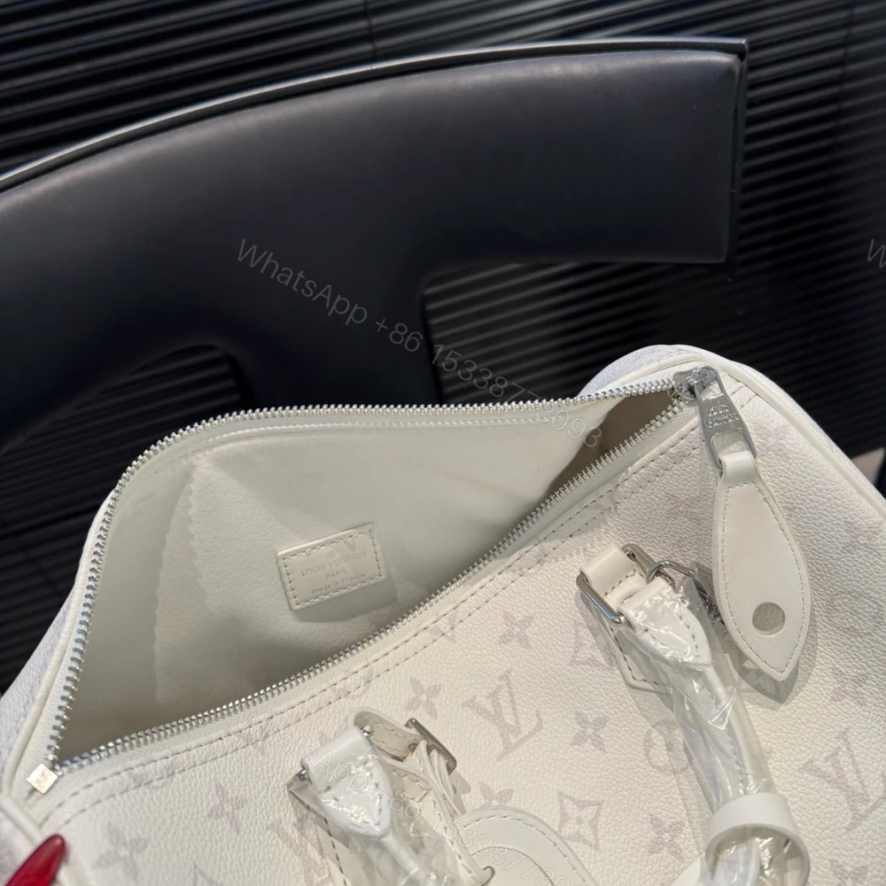 View 9 of Louis Vuitton Speedy P9 Bandoulière 30 In White 30Cm