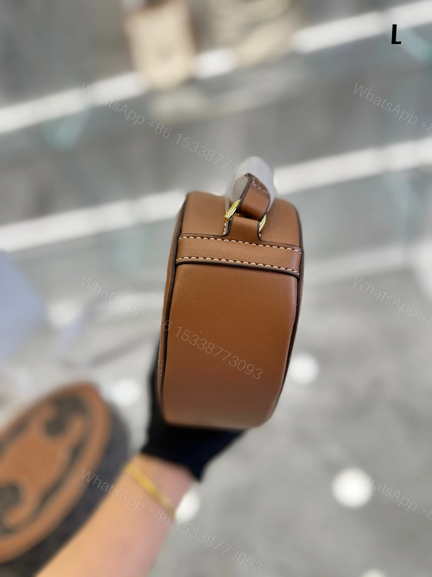 View 5 of CELINE OVAL BAG CUIR TRIOMPHE IN TEXTILE AND CALFSKIN NATURAL 20CM 198602EFL02NT