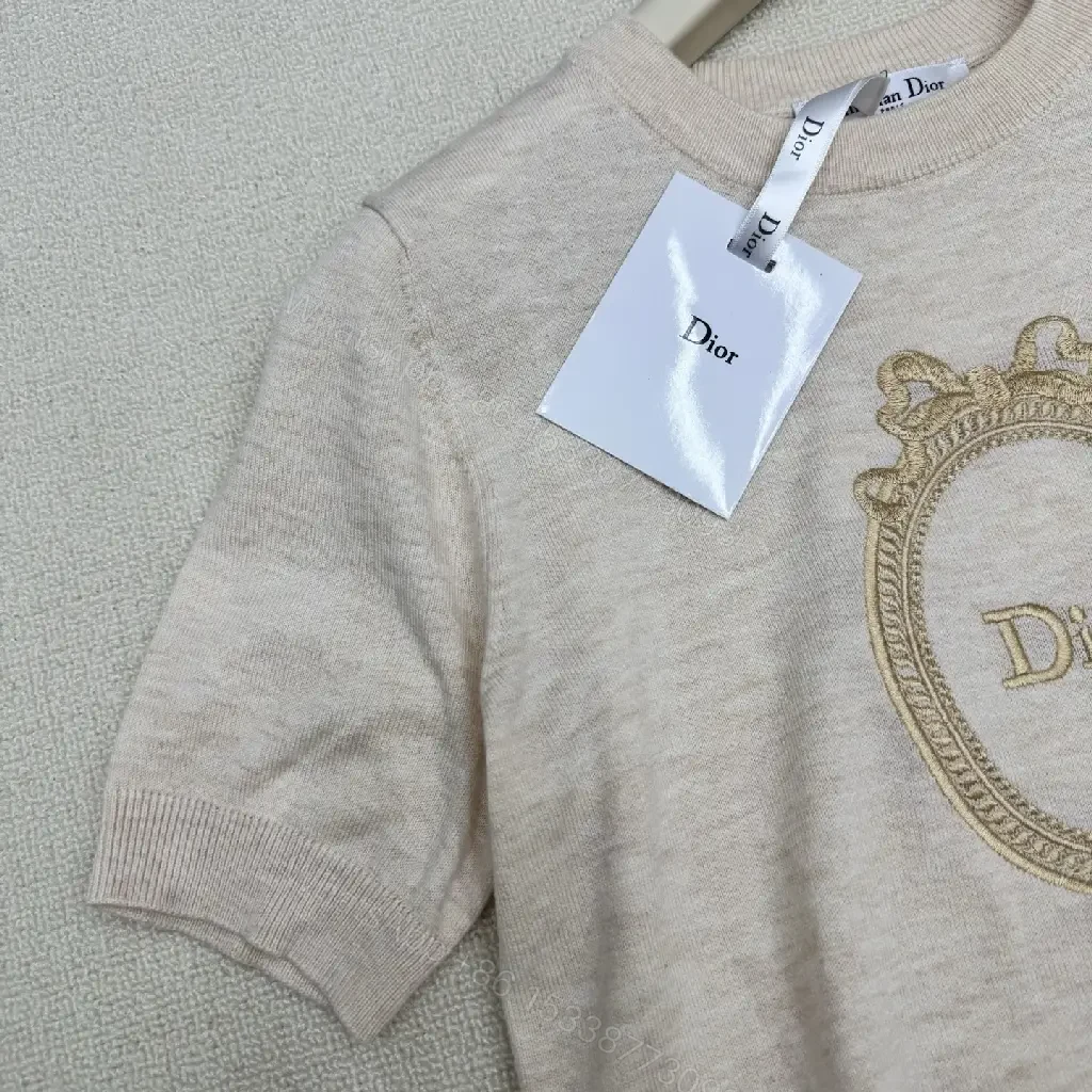 View 4 of Beige Cotton Knit Tee with Gold Crest Emblem