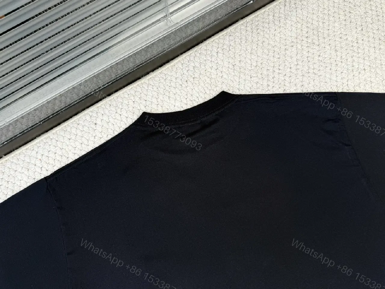 View 9 of Black Cotton Blend Relaxed Tee with Avant-Garde Graphic Edge