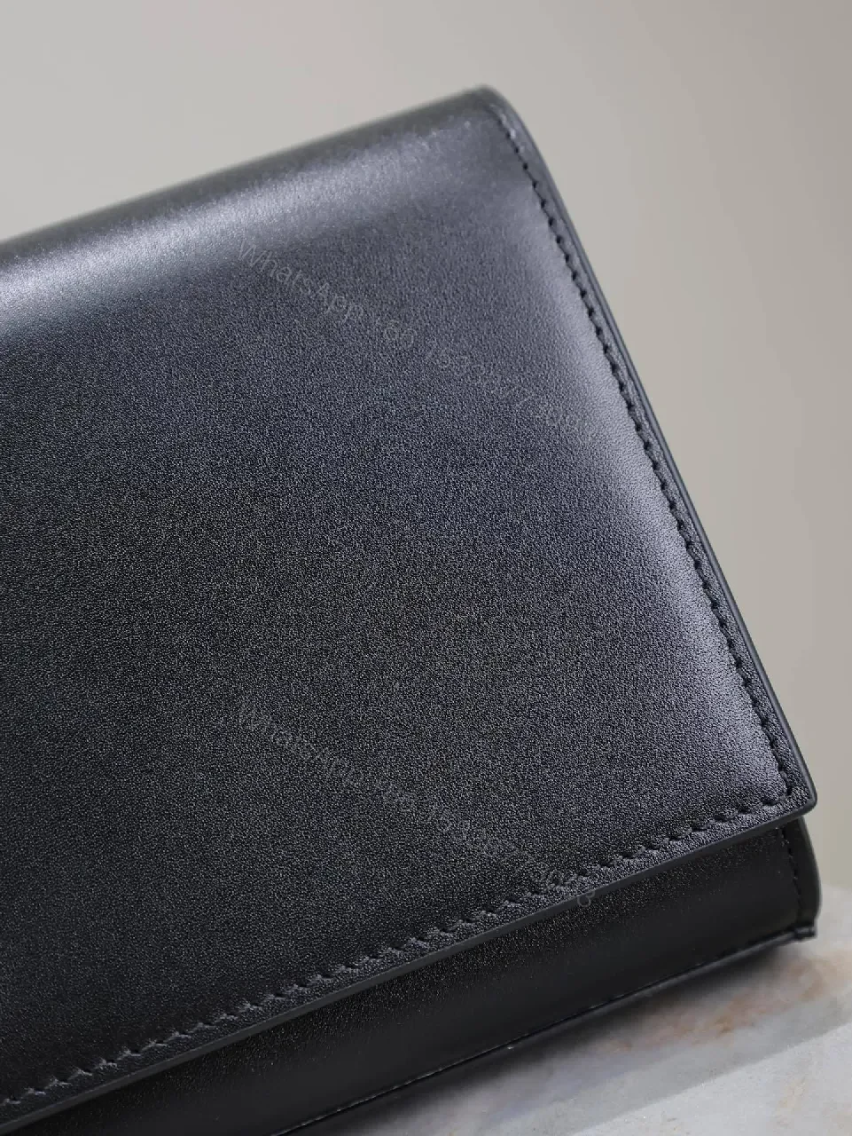 View 6 of Elegant Leather Clutch: Black, Gold Hardware, Minimalist Luxe