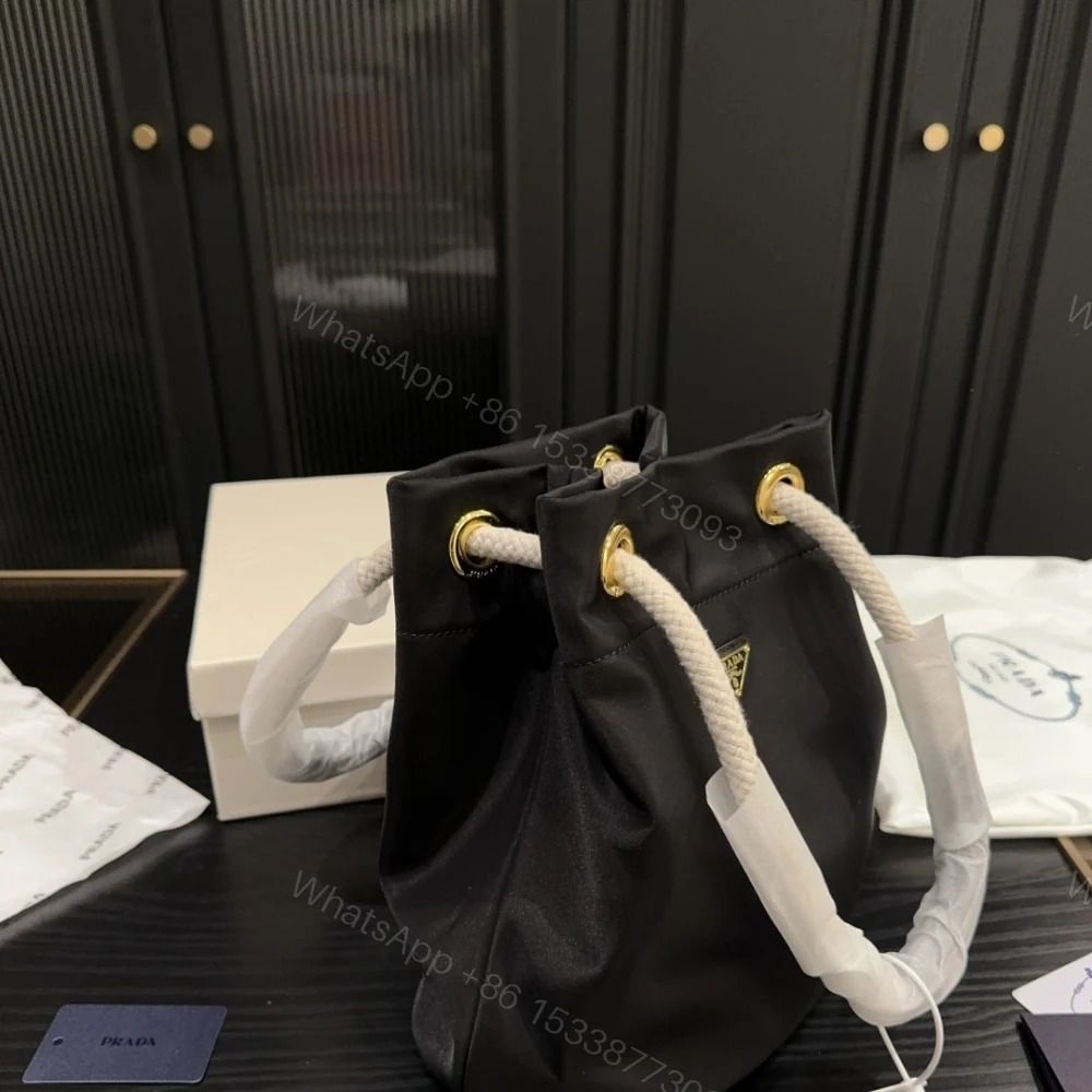 View 3 of PRADA MARINER RE NYLON SMALL BUCKET BAG BLACK 22CM 1BE082 2HG8 F0002 V OOO