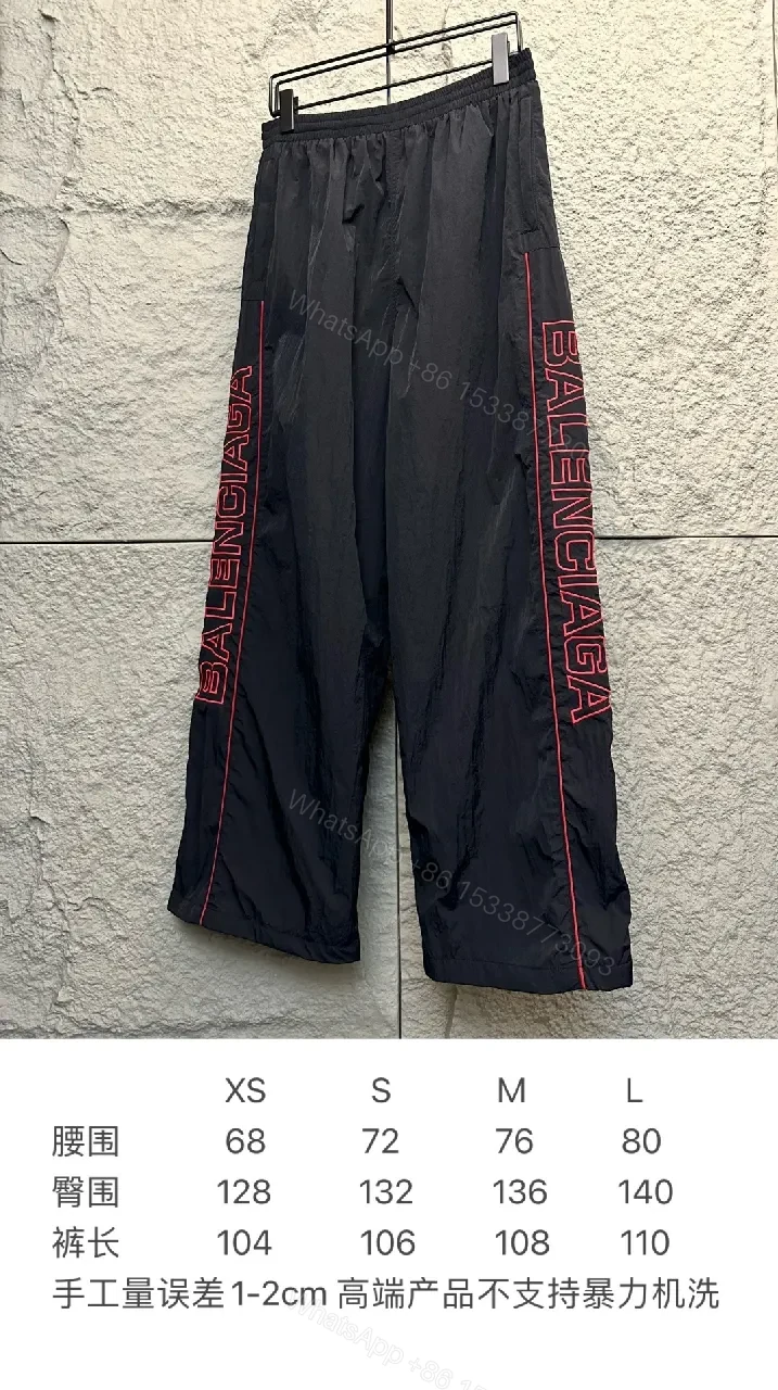 View 6 of Bold Red BALENCIAGA Logo Nylon Track Pants