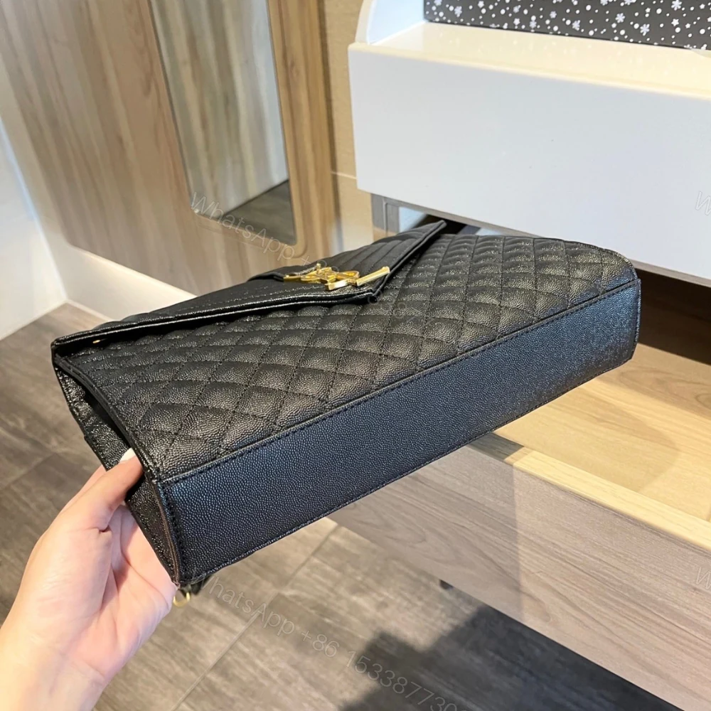 View 7 of Saint Laurent Envelope Large In Quilted Grain De Poudre Embossed Black Gold 31Cm 600166BOW911000