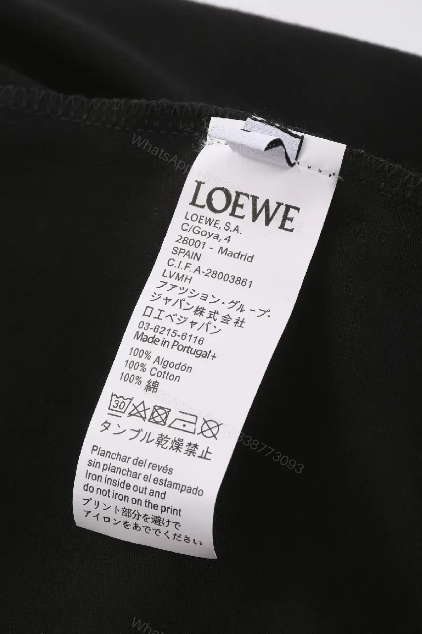 View 9 of Black Cotton Tee — Premium Comfort, Subtle Signature Detail, Modern Fit