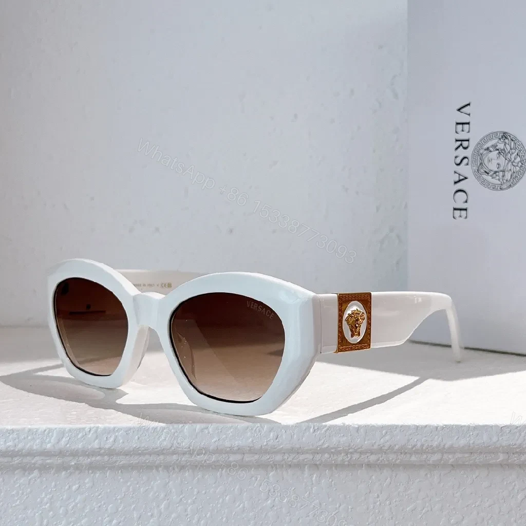 View 8 of Bold Tortoise Cat-Eye Sunglasses with Gold Medallion Accents