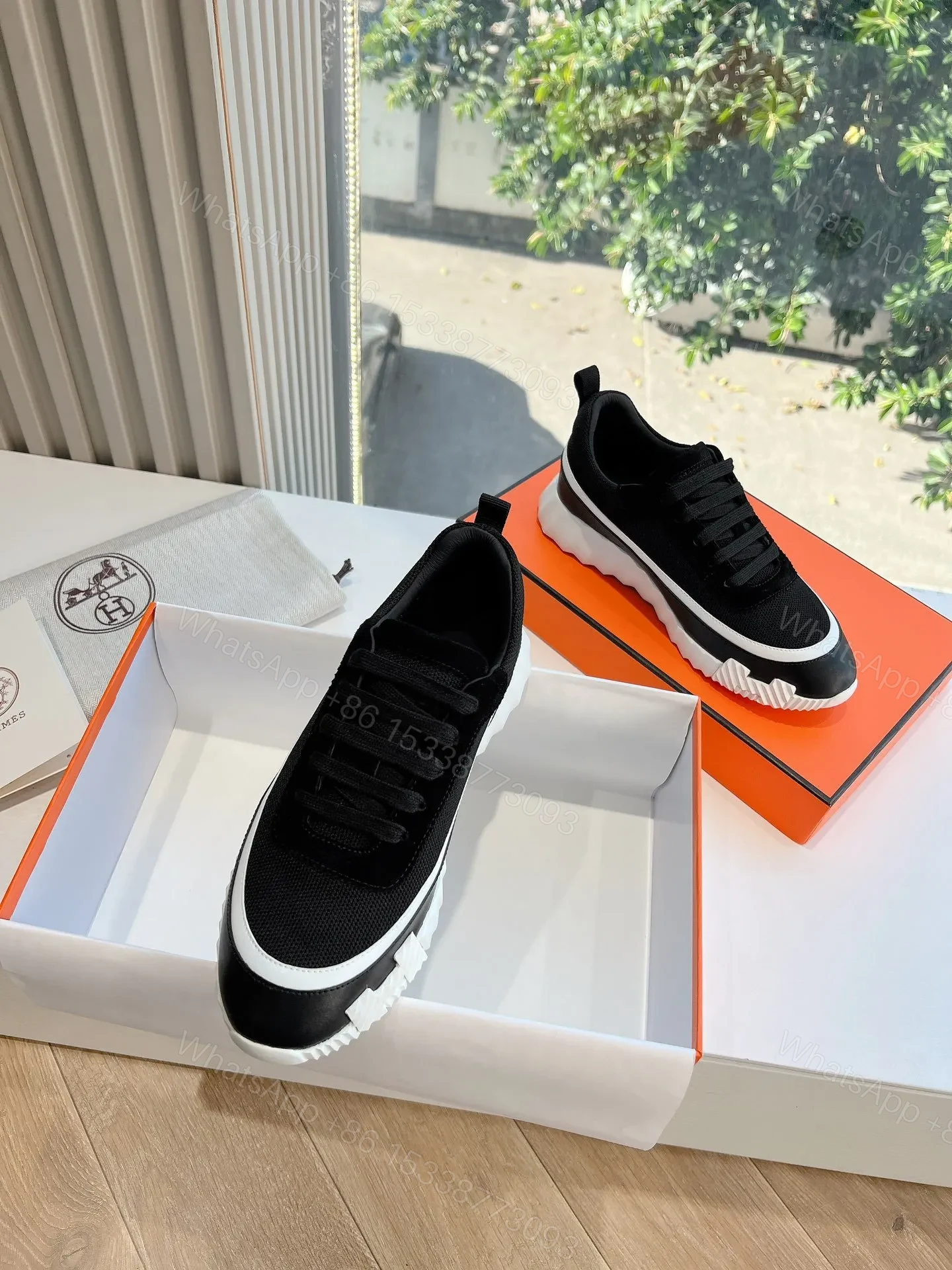 View 4 of Hermes Women Black Mesh And Leather Sneakers