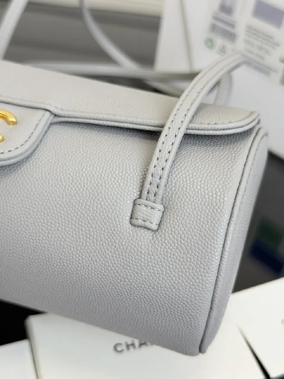 View 6 of Textured Leather Mini Bag – Slim Gold Logo, Gray