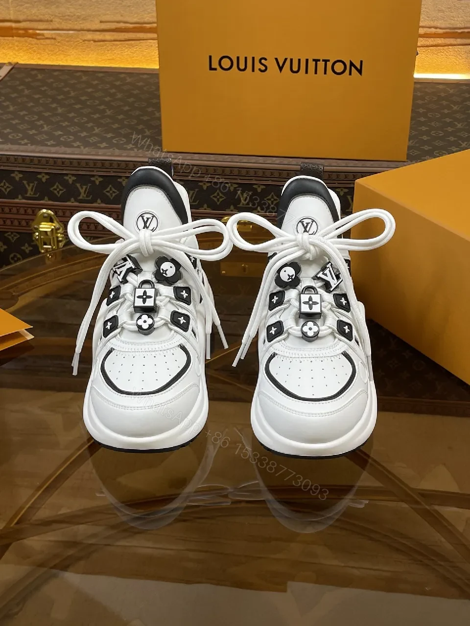 View 5 of Premium Leather High-Top Sneakers with LV Embellishments