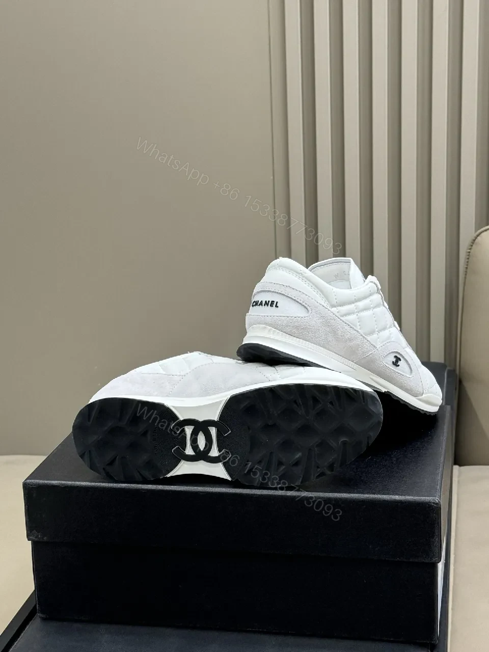 View 6 of White Quilted Leather Low-Top Sneakers with Signature Detailing