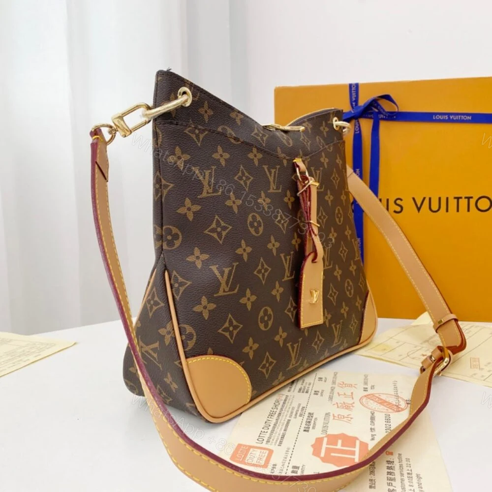 View 2 of Louis Vuitton Odeon MM Monogram Canvas Natural 31Cm M45355