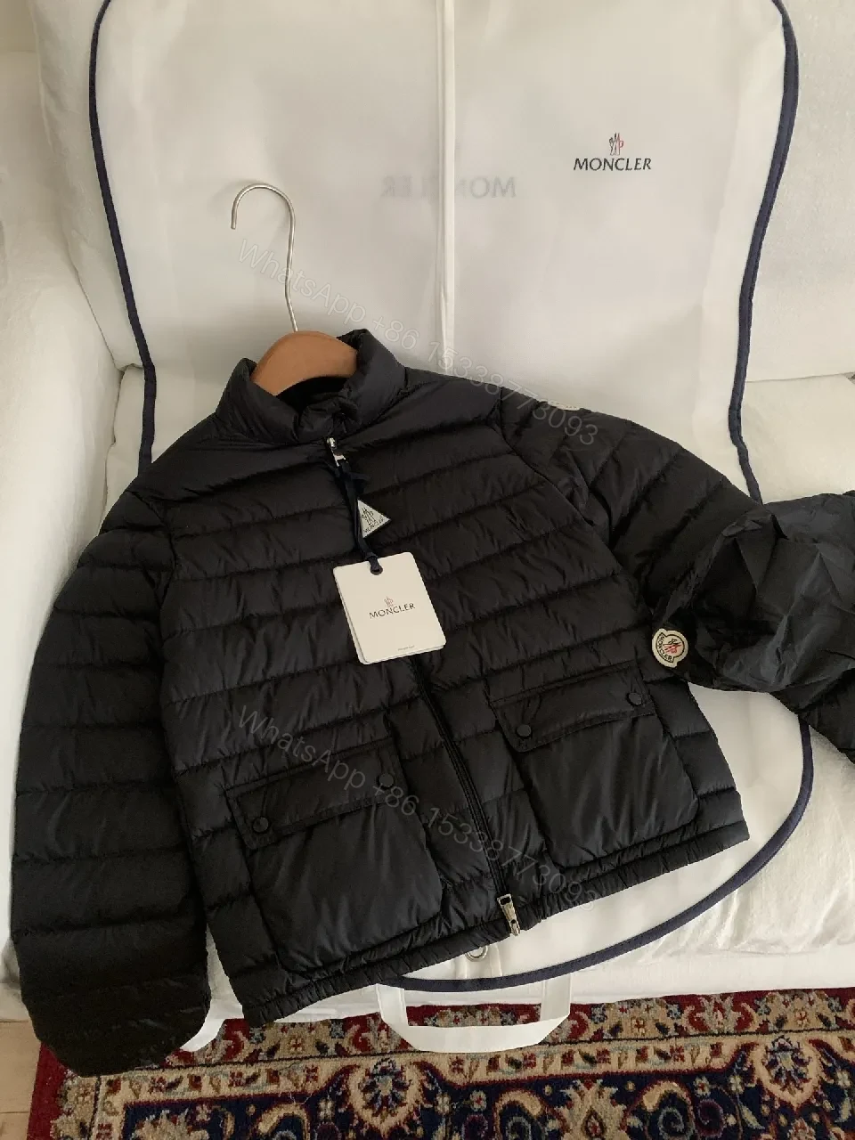 View 9 of Black Nylon Puffer Jacket: Sleek, Insulated Warmth with Patch