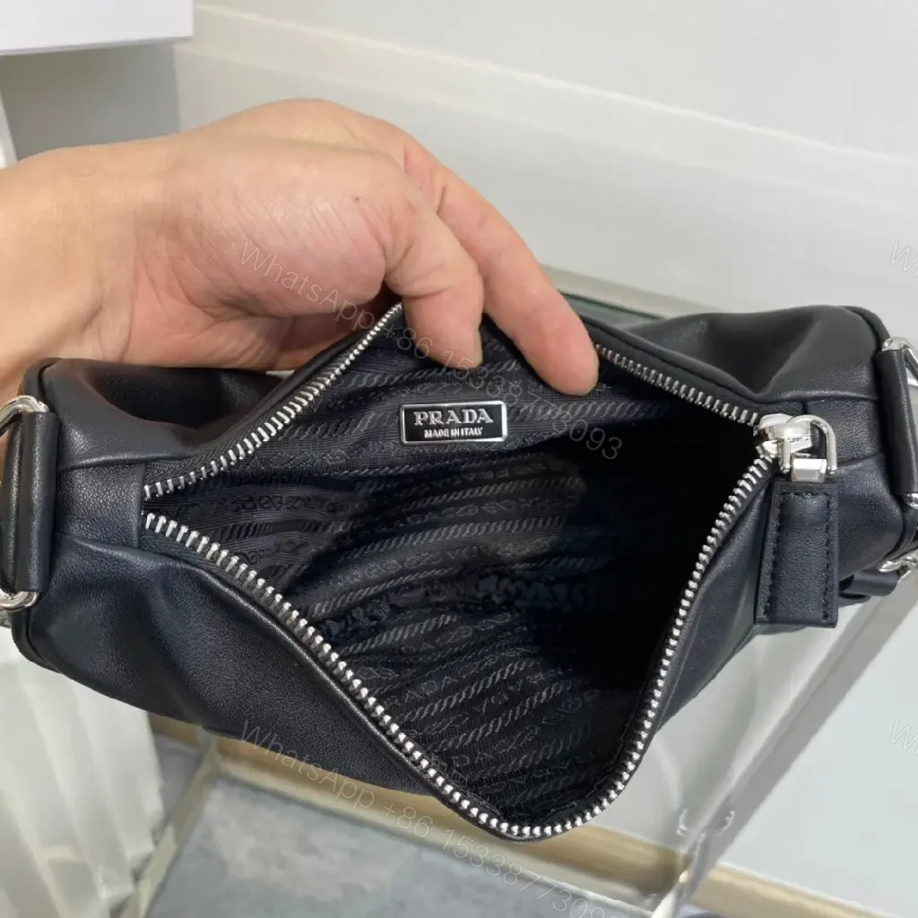 View 3 of Triangular Black Leather Belt Bag — Modern Minimalist Luxury Perforated Edge
