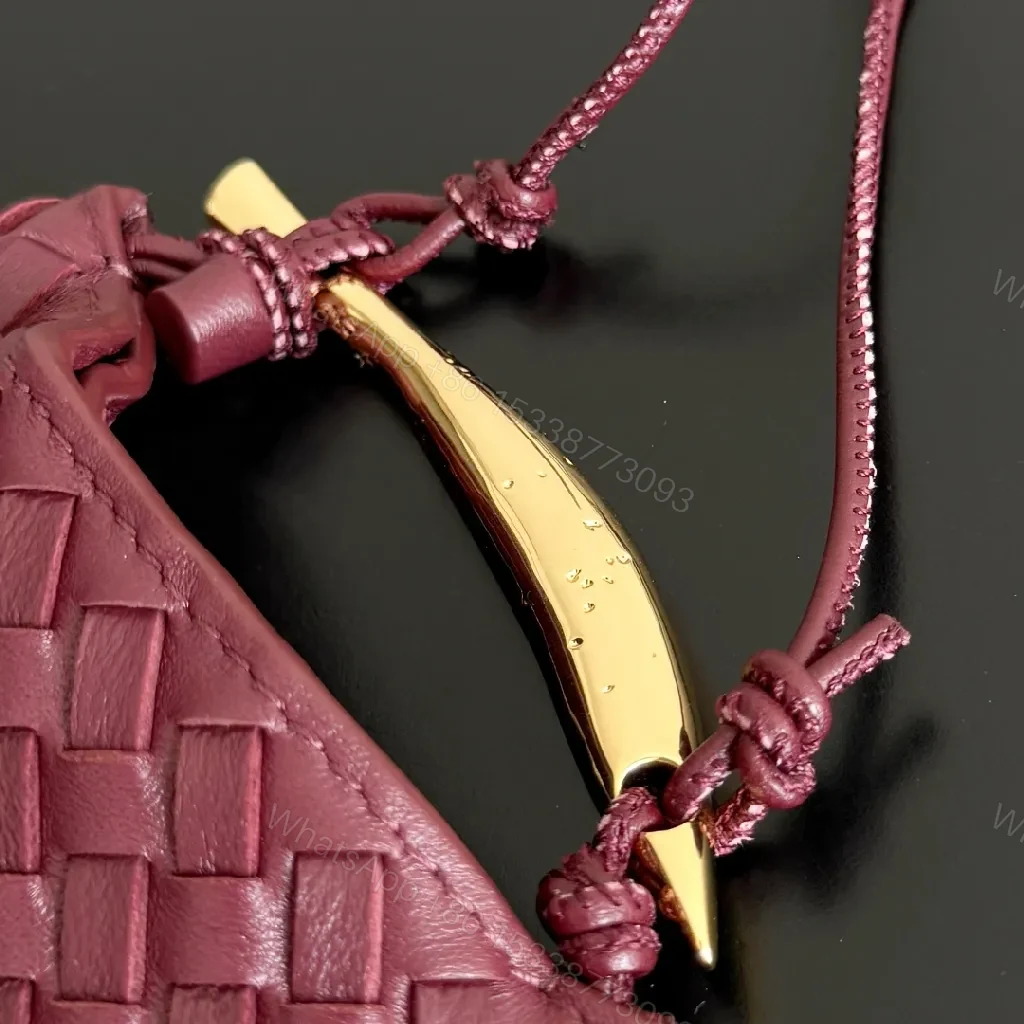 View 2 of Textured Plum Mini Bag: Handwoven Leather, Luxe Compact