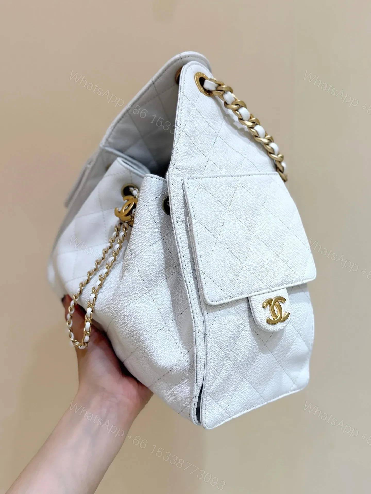 View 2 of CHANEL 25 HANDBAG IN WHITE 30 GOLD HARDWARE
