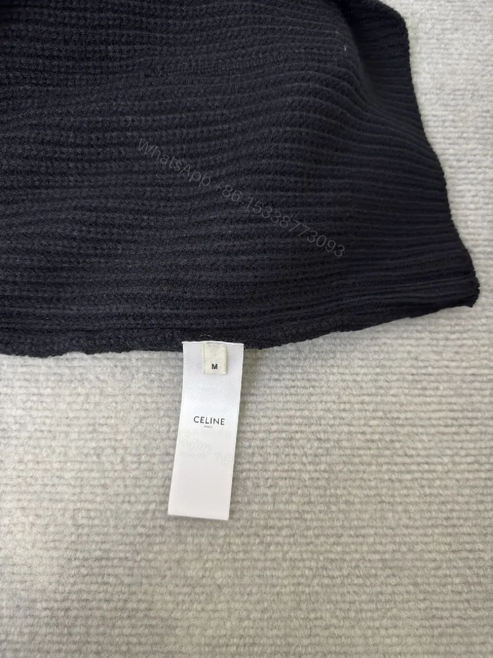 View 2 of Chunky Knit Hoodie in Deep Black with Subtle Logo Embossing, Modern Luxe