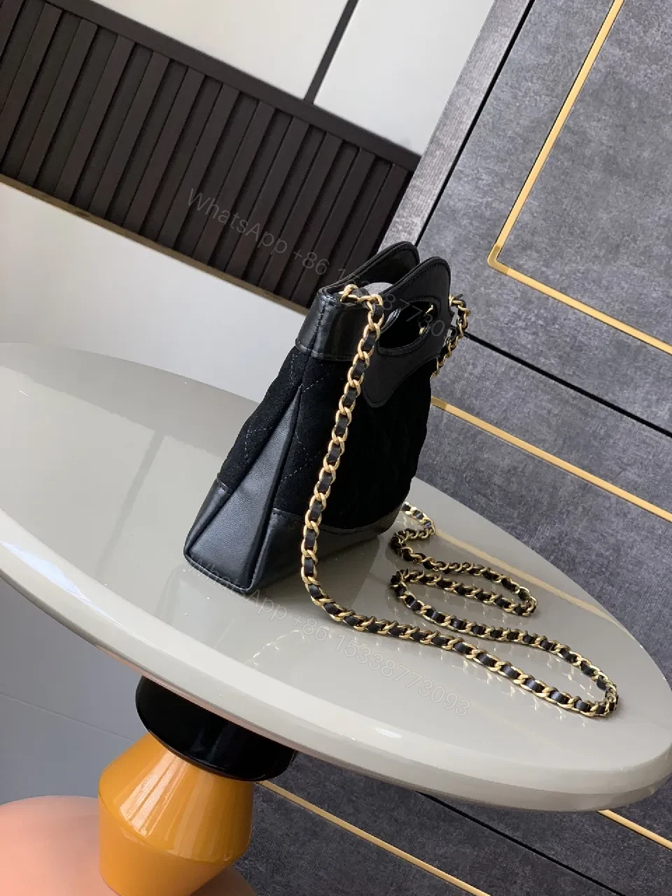 View 9 of Quilted Faux-Leather Handbag with Gold Hardware, Structured Style