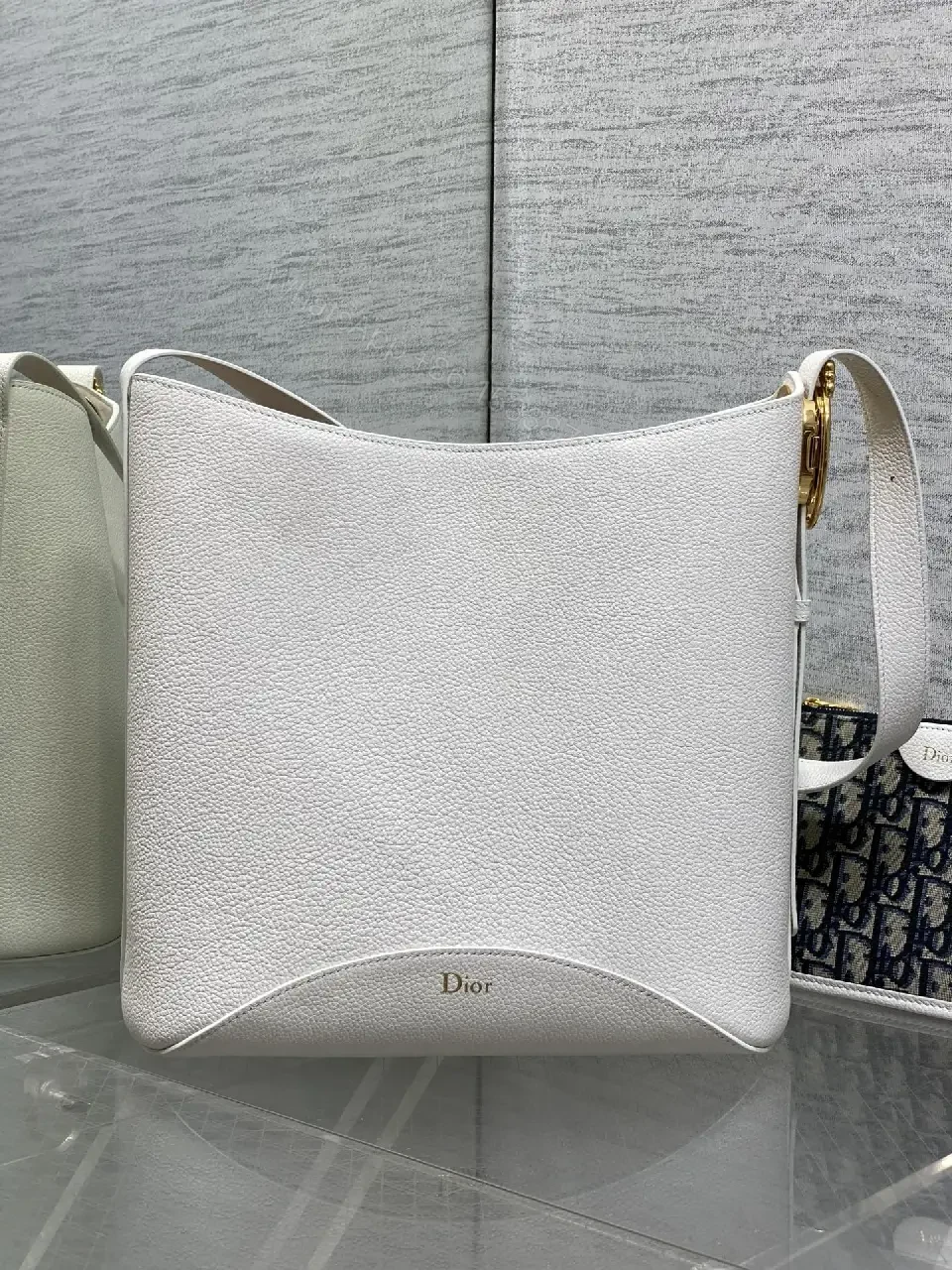 View 10 of White Pebbled Leather Crescent Bag with Navy Dior Wallet Set
