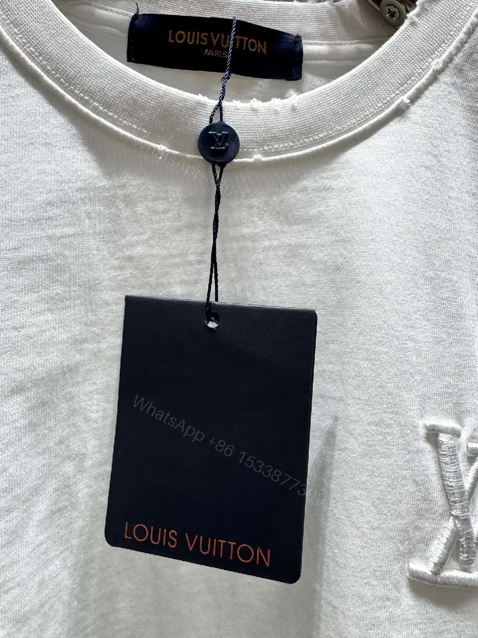 View 2 of Premium White Cotton Tee with Subtle Embroidered Accents
