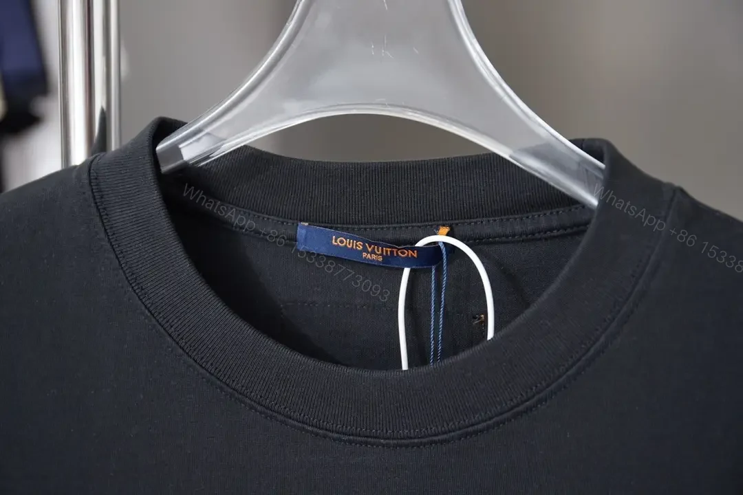 View 10 of Dark Luxury T-Shirt with Embroidered Logo - Premium Everyday Tee