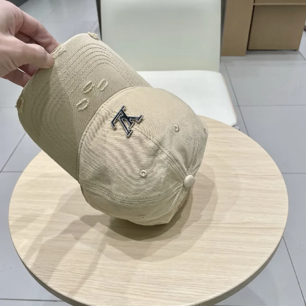 View 9 of Beige Cap with Textured Panels, Subtle LV-Inspired Emblem, Casual Luxury