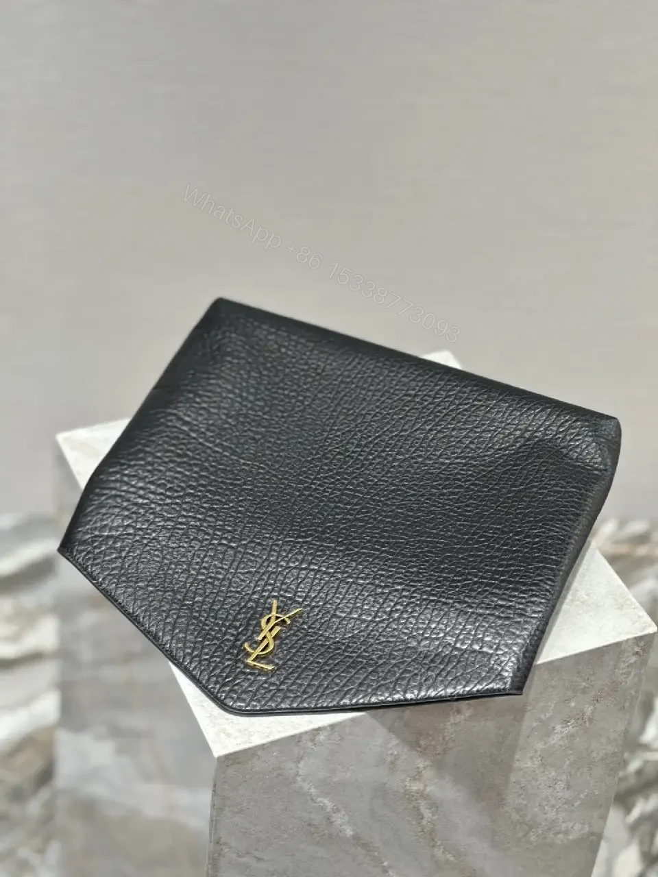 View 8 of Compact Black Leather Envelope Bag with Gold Logo