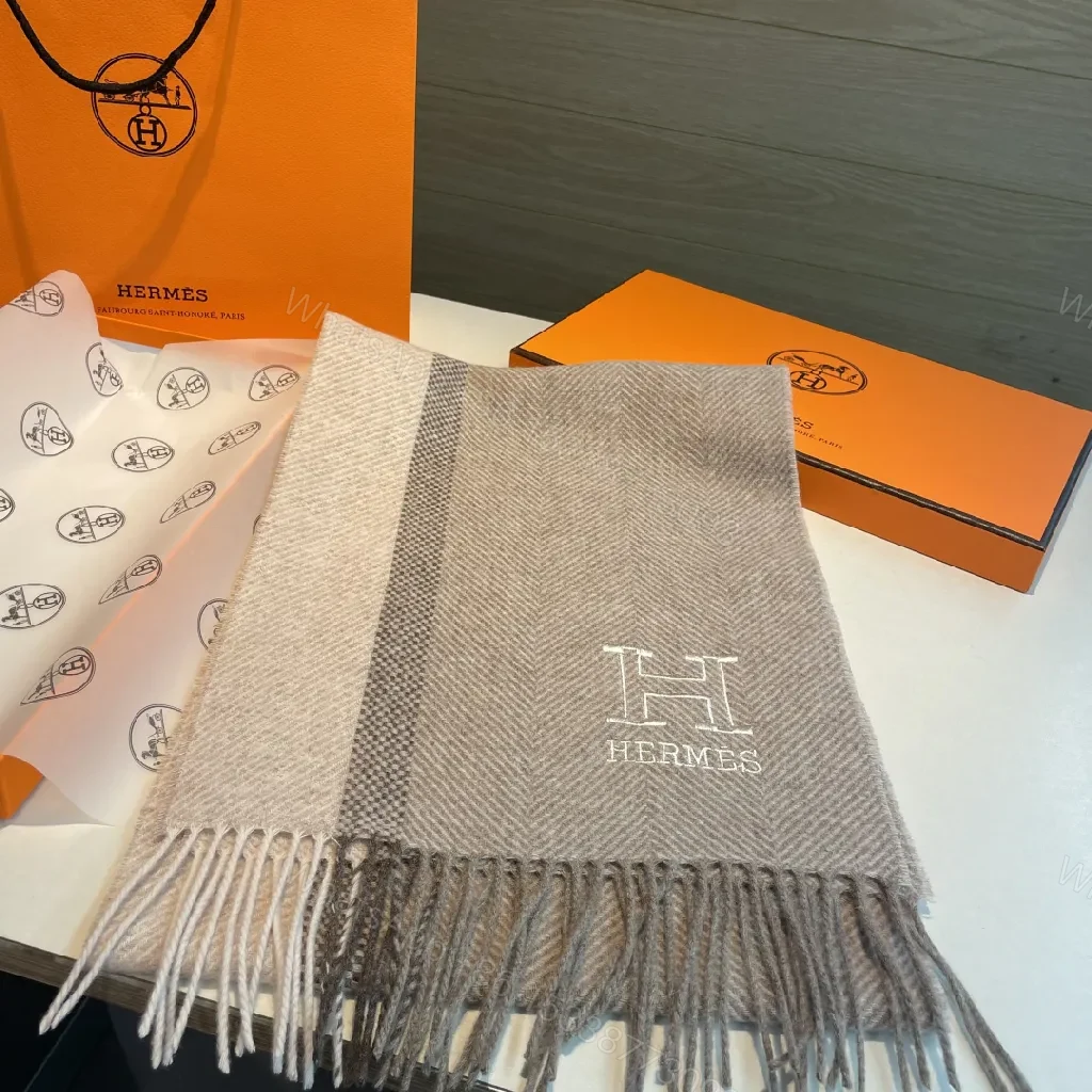 View 3 of Neutral Herringbone Knit Scarf with Subtle Emblem Detail