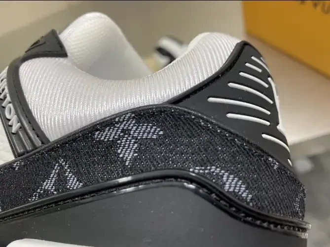 View 9 of LOUIS VUITTON TRAINER SNEAKERS IN WHITE AND BLACK – LSVT341
