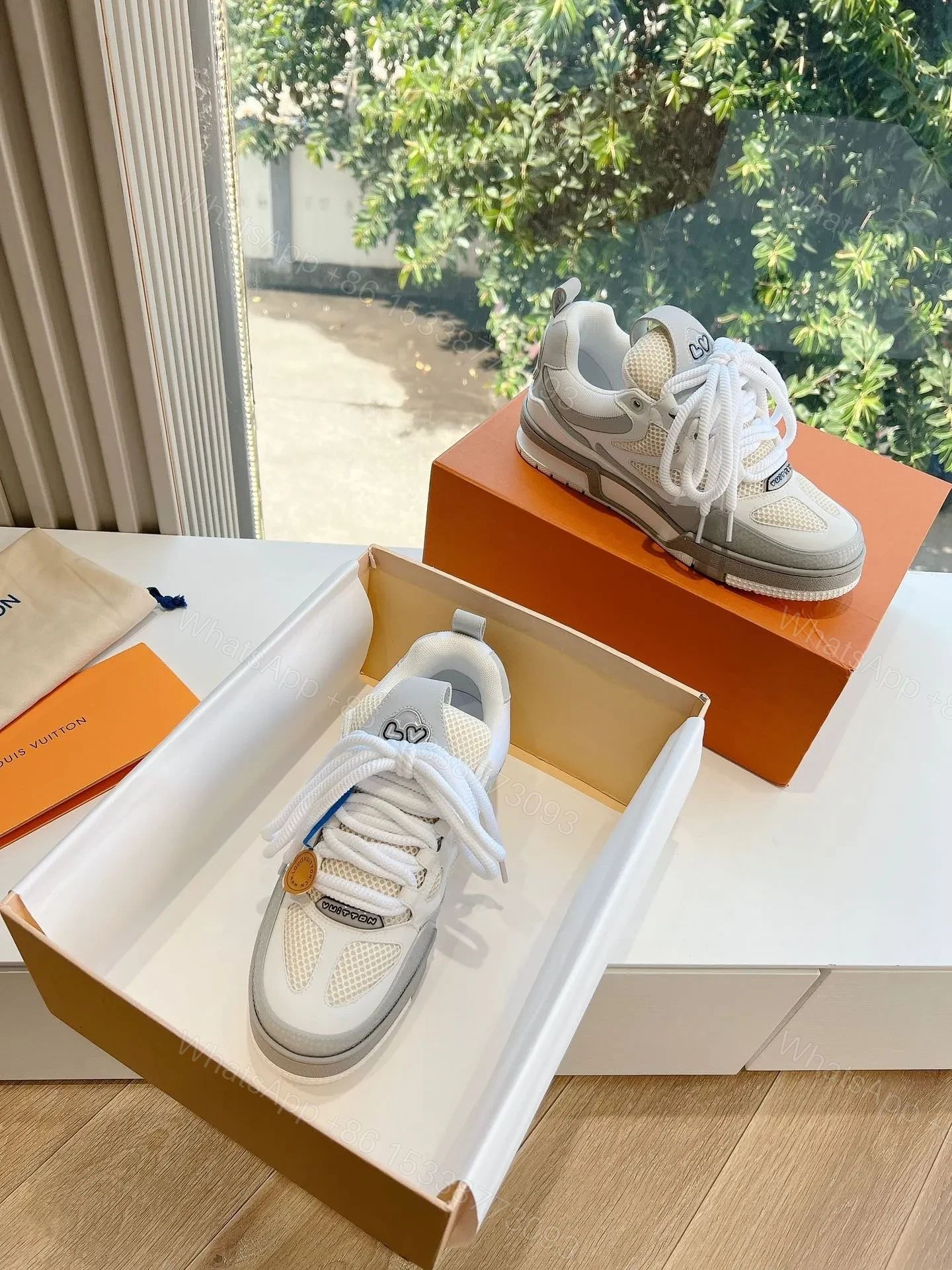 View 4 of LV Women White Mesh And Leather Sneakers