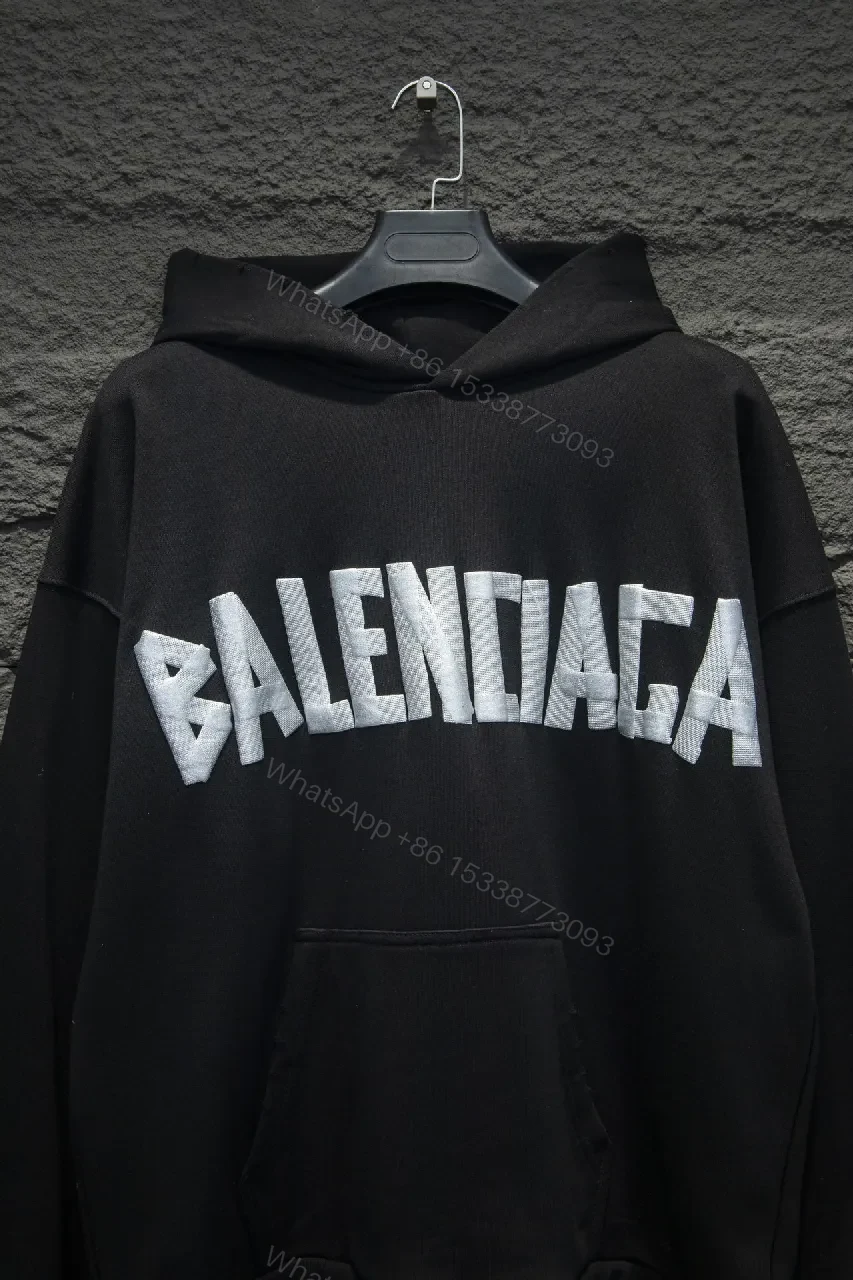 View 10 of Bold Logo Hoodie: Metallic Silver Logo, Oversized Comfort
